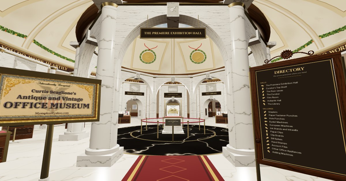 Inside the 3D Office Museum: a marble rotunda with a red carpet leading to the Premiere Exhibition Hall, flanked by the museum sign and a gallery directory.